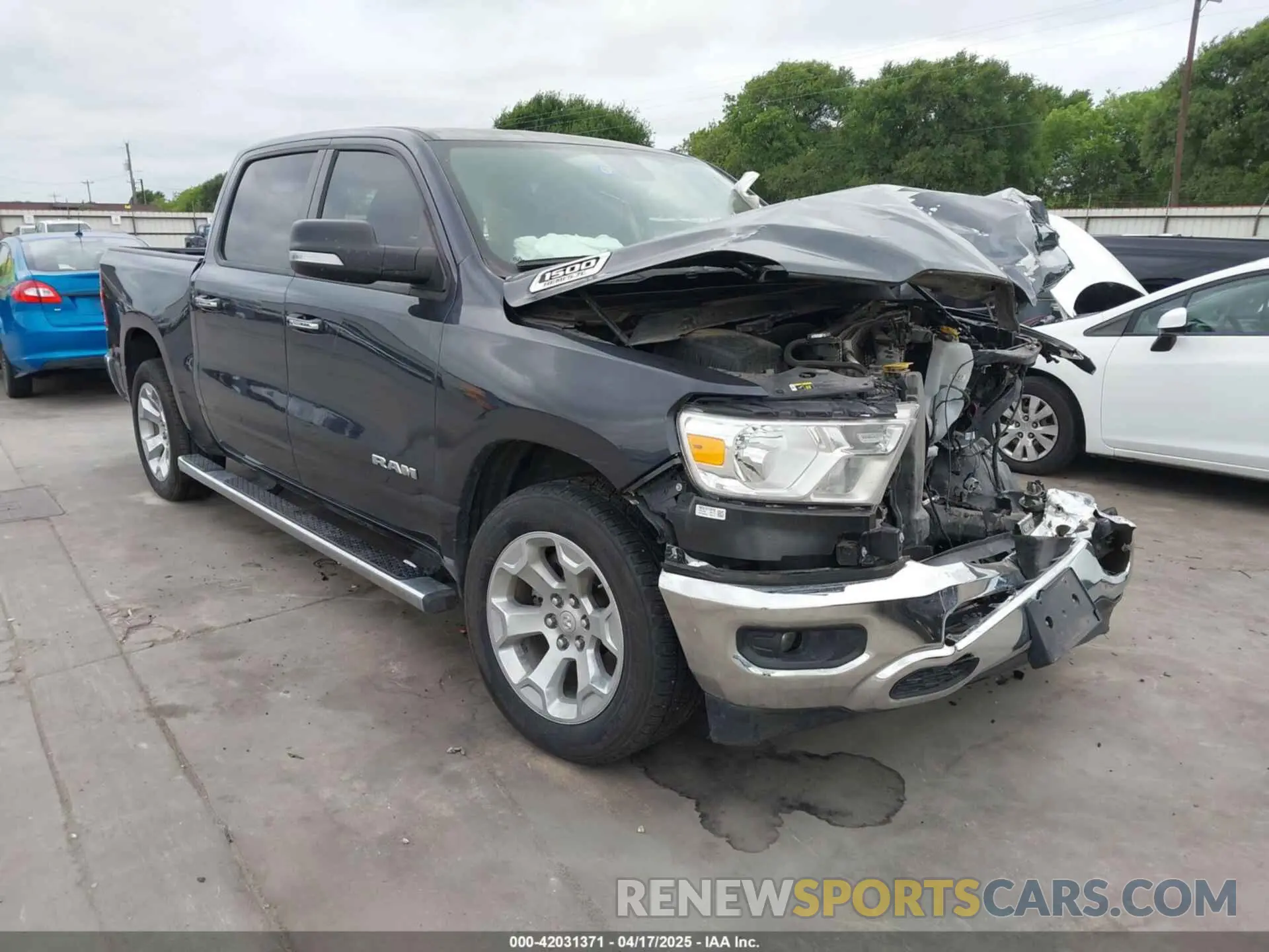1 Photograph of a damaged car 1C6RREFTXLN321456 RAM 1500 2020