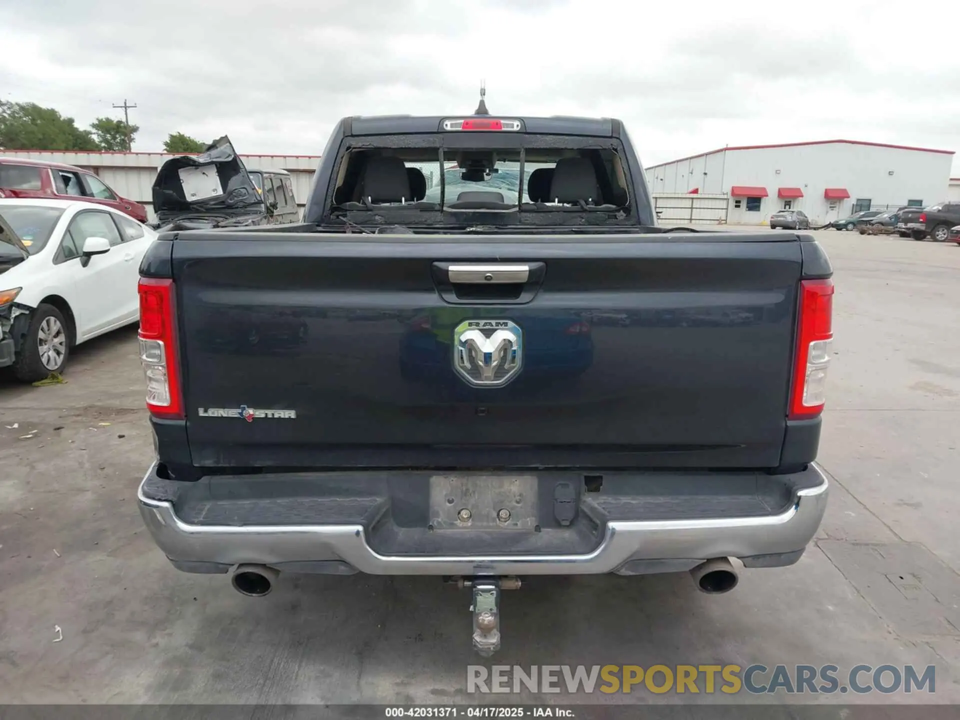 16 Photograph of a damaged car 1C6RREFTXLN321456 RAM 1500 2020