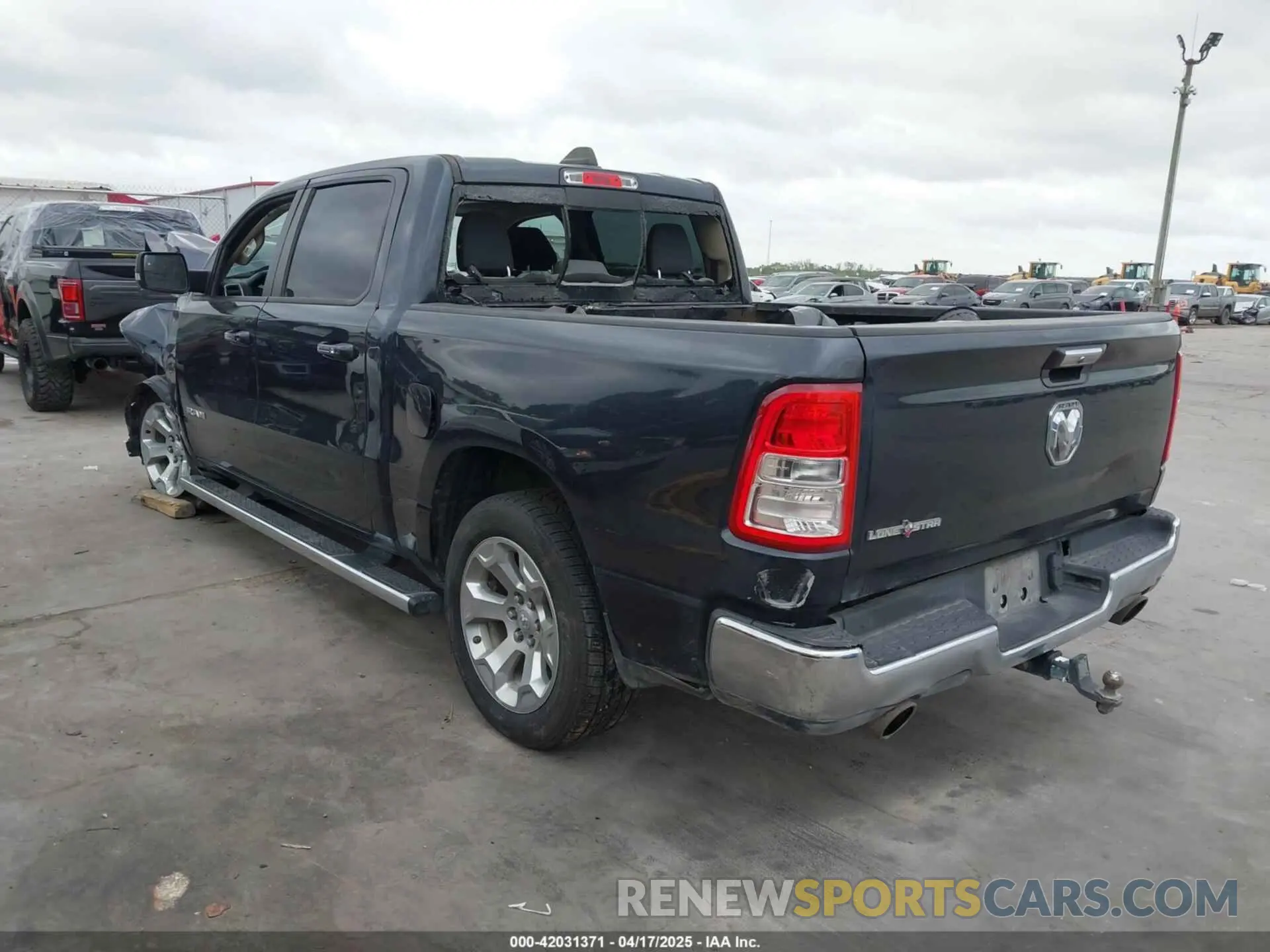 3 Photograph of a damaged car 1C6RREFTXLN321456 RAM 1500 2020