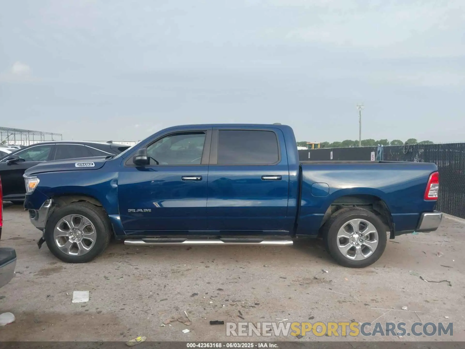 13 Photograph of a damaged car 1C6RREFTXLN406099 RAM 1500 2020