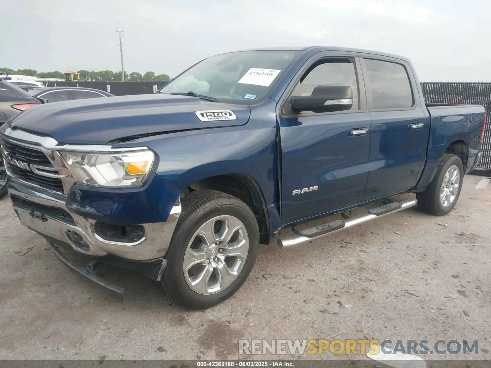 2 Photograph of a damaged car 1C6RREFTXLN406099 RAM 1500 2020