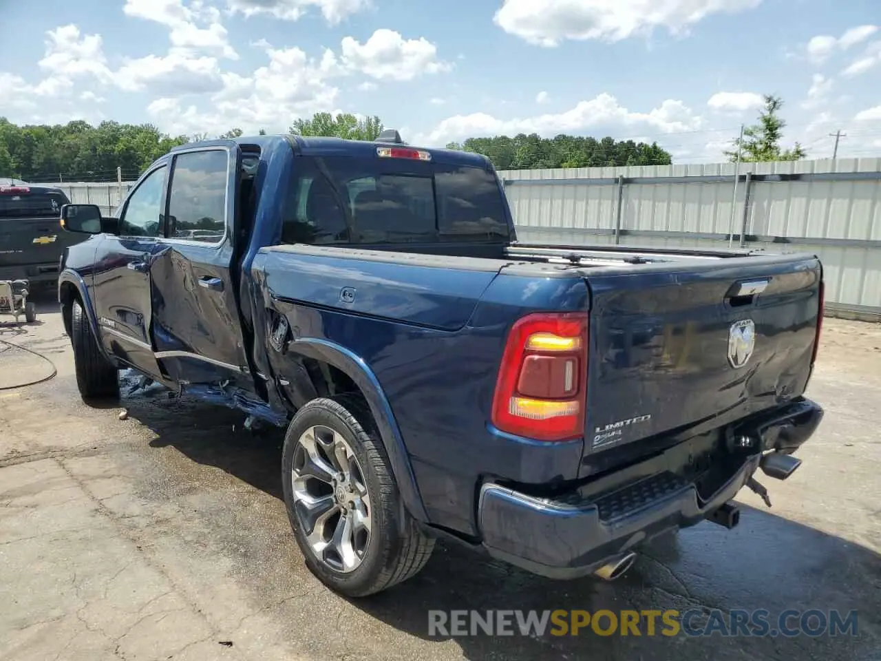2 Photograph of a damaged car 1C6RREHT1LN129498 RAM 1500 2020