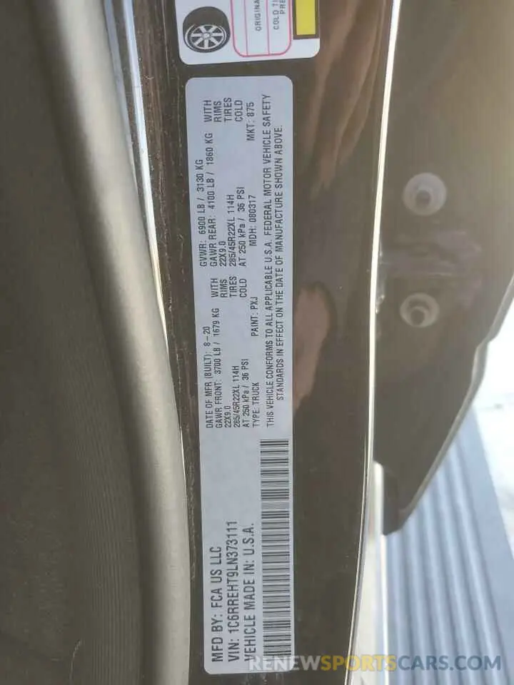 14 Photograph of a damaged car 1C6RREHT9LN373111 RAM 1500 2020