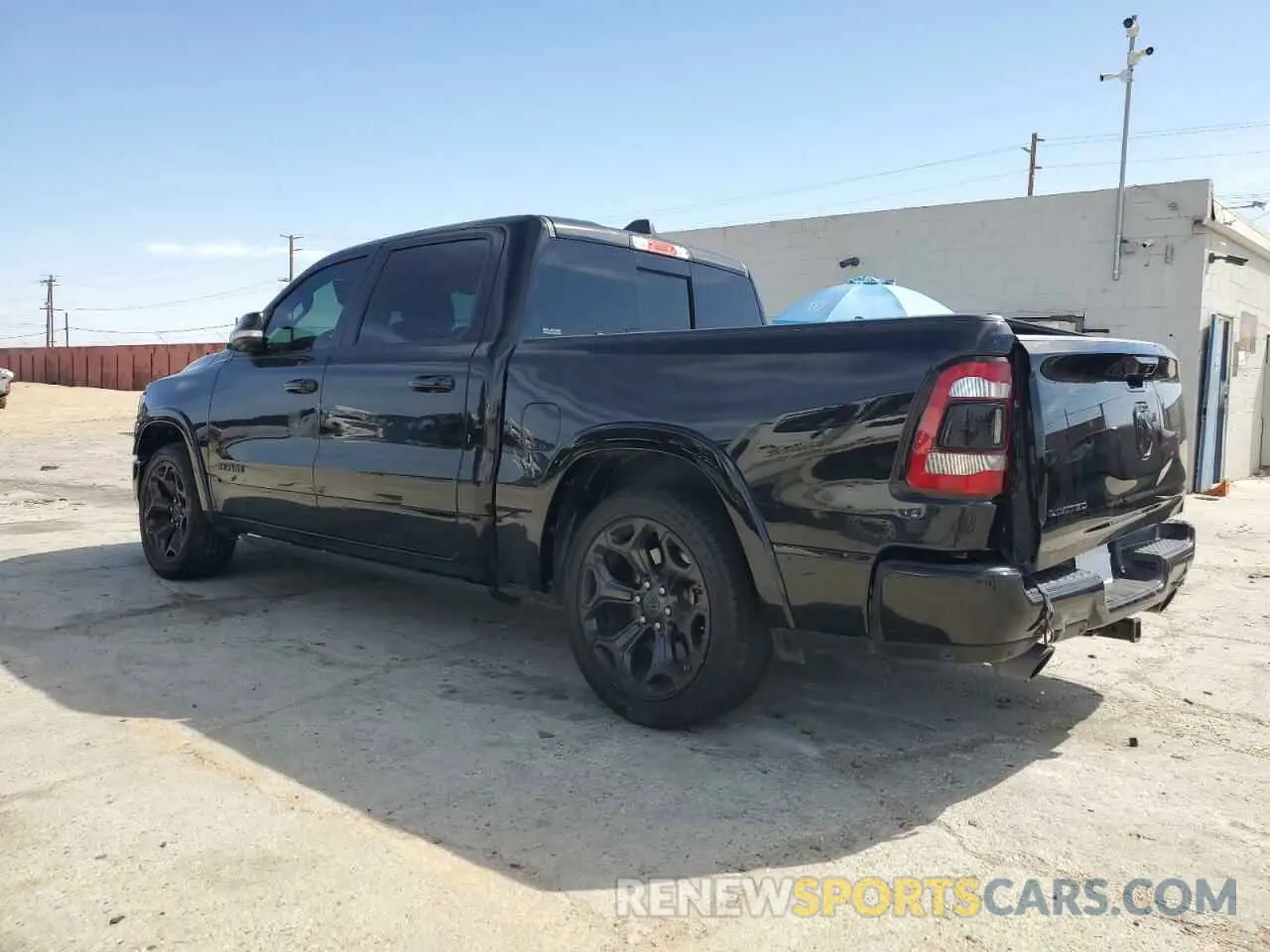 2 Photograph of a damaged car 1C6RREHT9LN373111 RAM 1500 2020