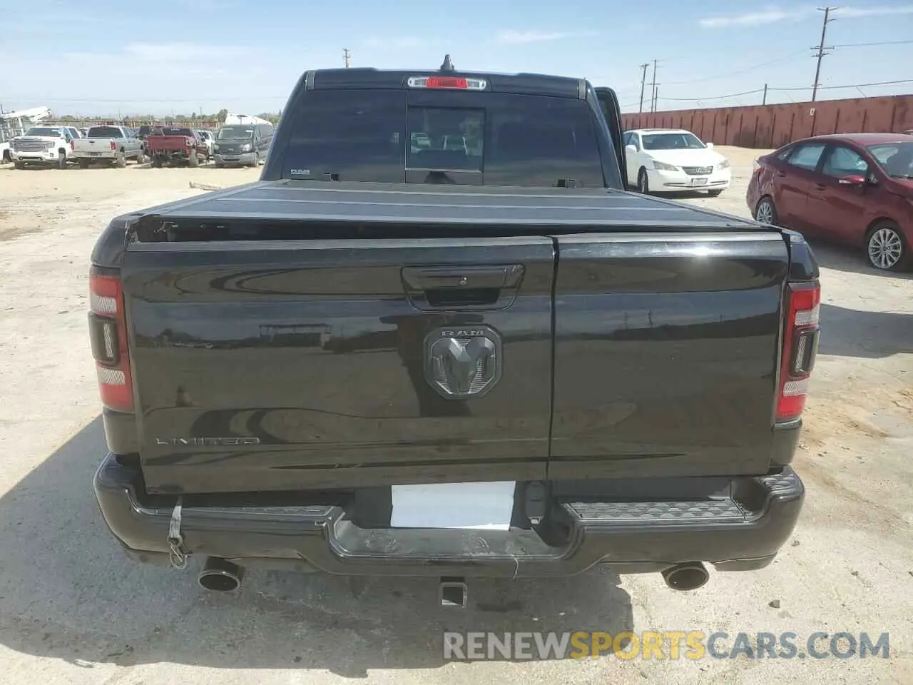 6 Photograph of a damaged car 1C6RREHT9LN373111 RAM 1500 2020