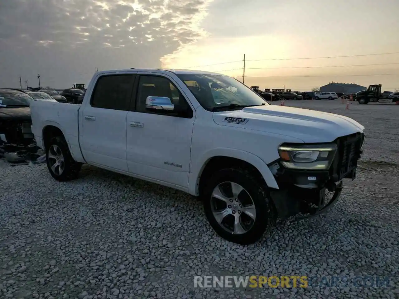 4 Photograph of a damaged car 1C6RREJT9LN232954 RAM 1500 2020