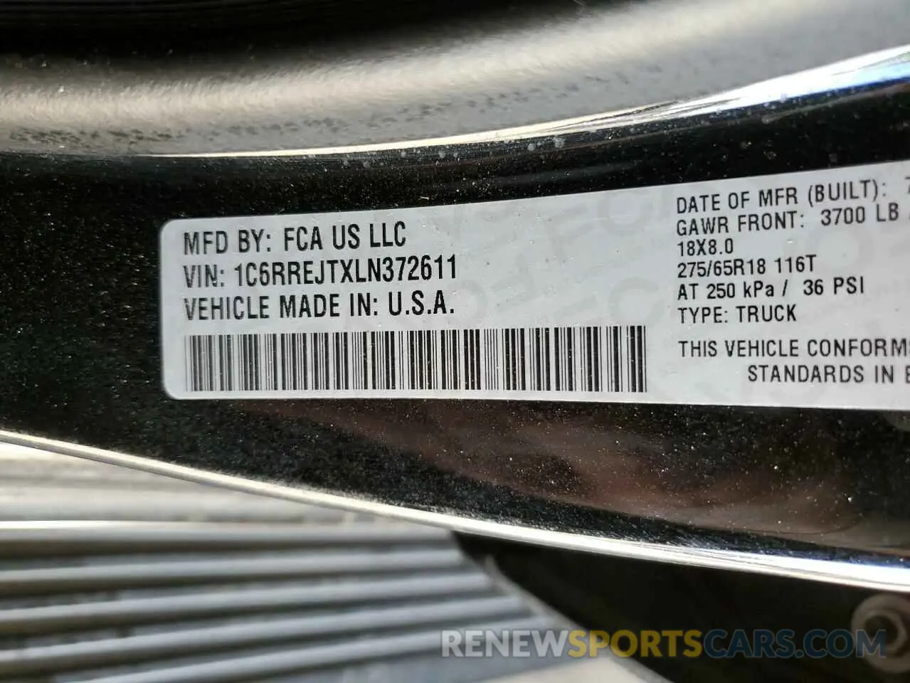 13 Photograph of a damaged car 1C6RREJTXLN372611 RAM 1500 2020