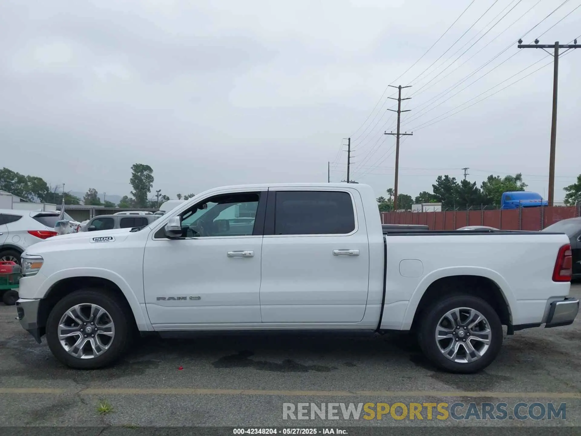 14 Photograph of a damaged car 1C6RREKT5LN191639 RAM 1500 2020