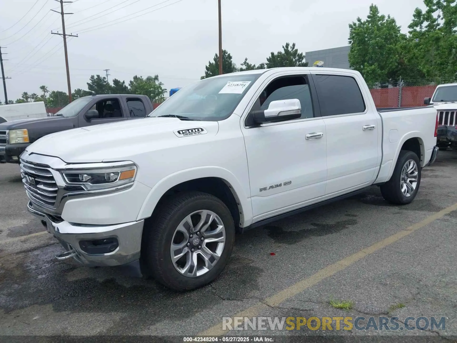 2 Photograph of a damaged car 1C6RREKT5LN191639 RAM 1500 2020