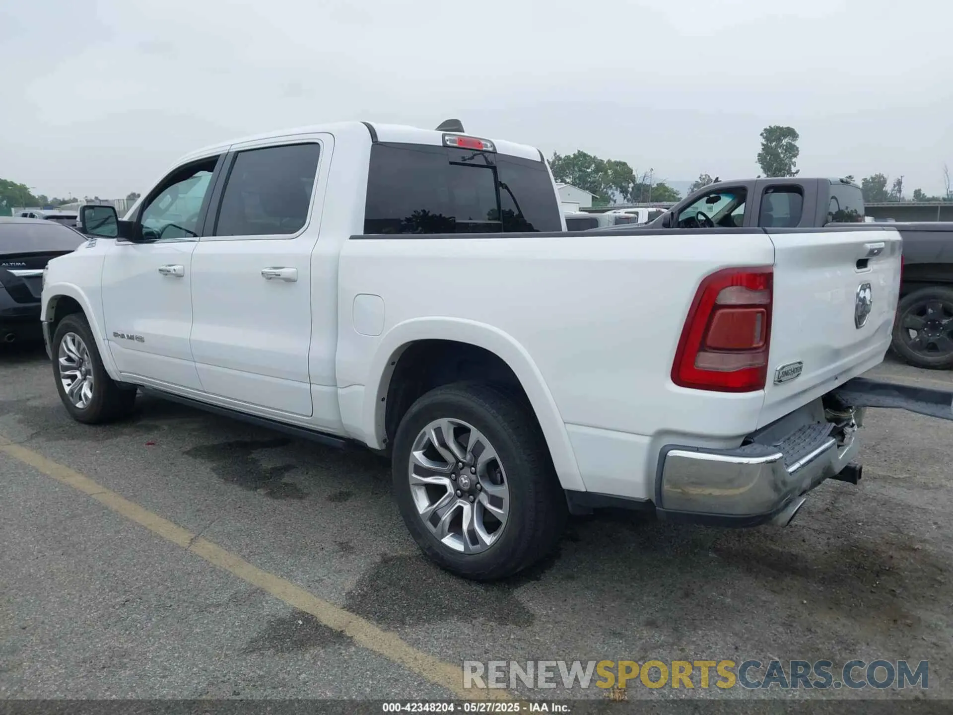 3 Photograph of a damaged car 1C6RREKT5LN191639 RAM 1500 2020