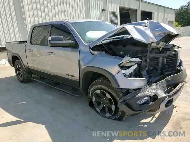 13 Photograph of a damaged car 1C6RRELT0LN303553 RAM 1500 2020