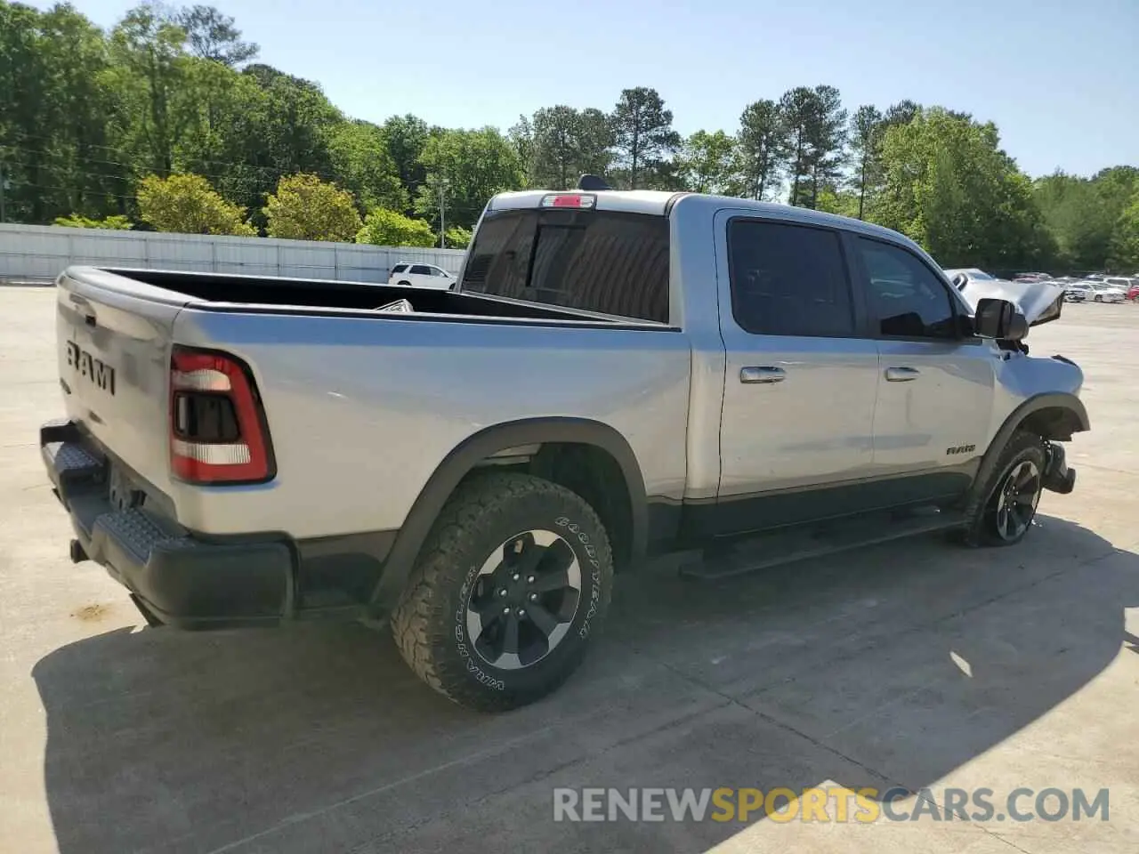 3 Photograph of a damaged car 1C6RRELT0LN303553 RAM 1500 2020