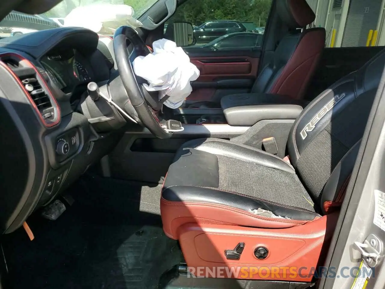 7 Photograph of a damaged car 1C6RRELT0LN303553 RAM 1500 2020