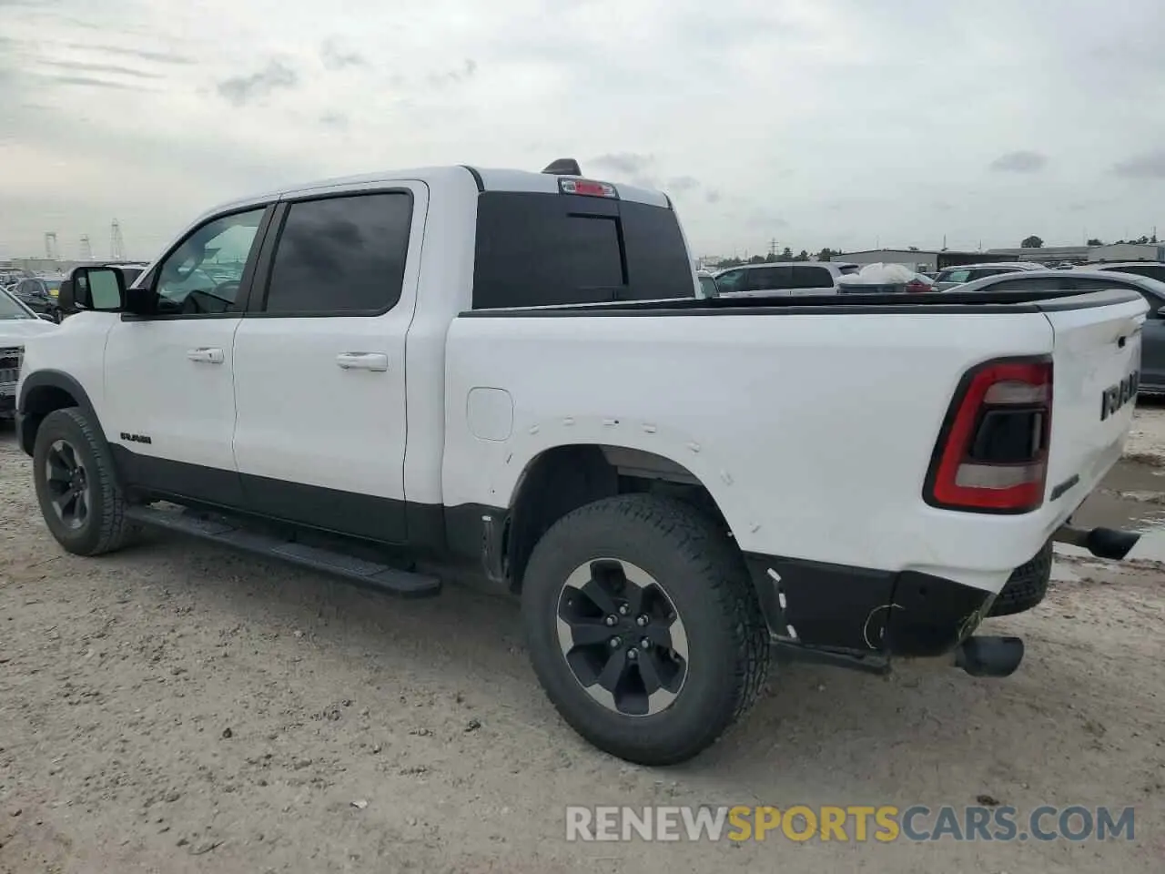 2 Photograph of a damaged car 1C6RRELT2LN303523 RAM 1500 2020