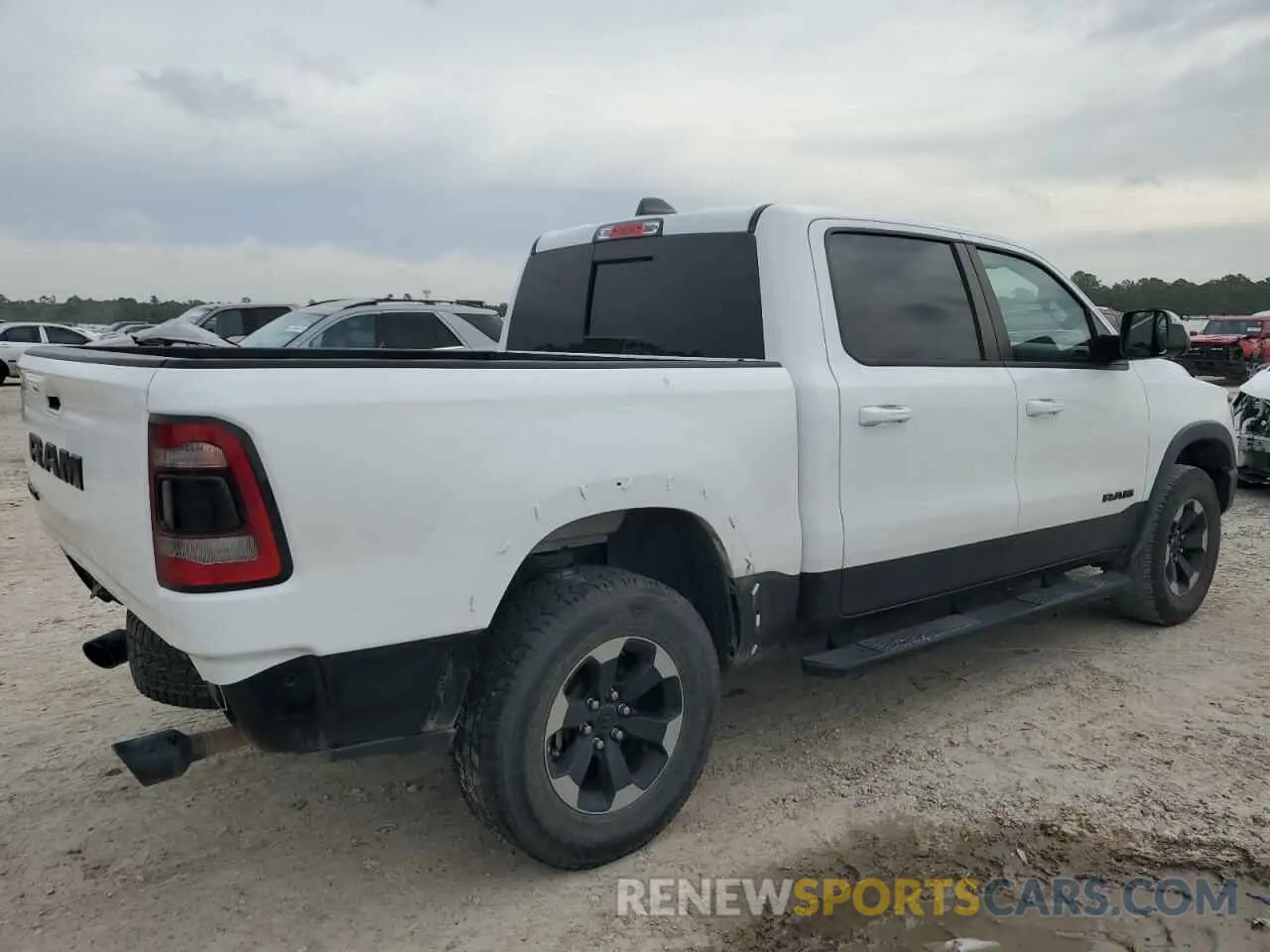 3 Photograph of a damaged car 1C6RRELT2LN303523 RAM 1500 2020