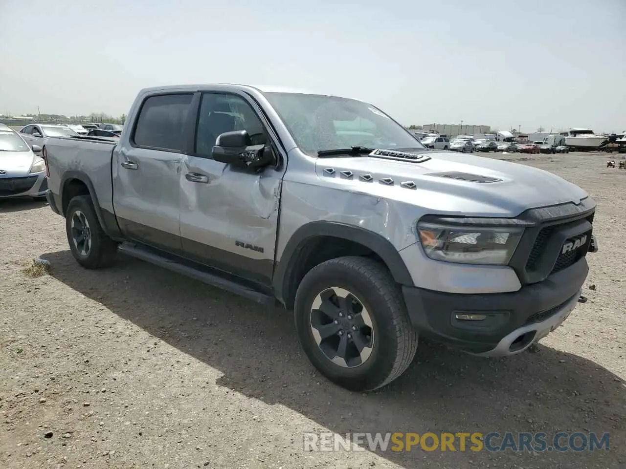 4 Photograph of a damaged car 1C6RRELT8LN303588 RAM 1500 2020