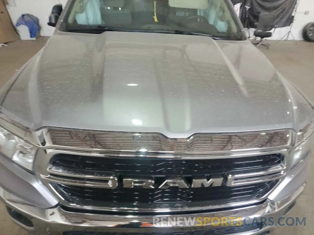 11 Photograph of a damaged car 1C6RREMT7LN238697 RAM 1500 2020