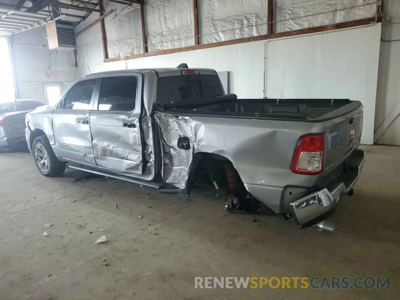2 Photograph of a damaged car 1C6RREMT7LN238697 RAM 1500 2020