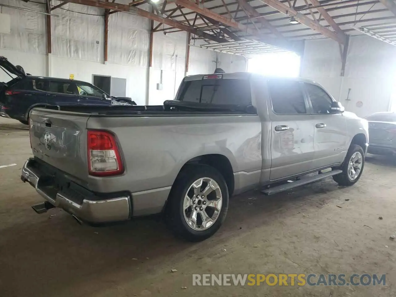3 Photograph of a damaged car 1C6RREMT7LN238697 RAM 1500 2020