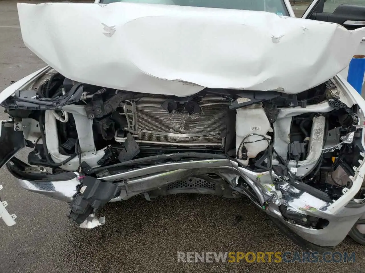 12 Photograph of a damaged car 1C6RRFBG3LN394618 RAM 1500 2020