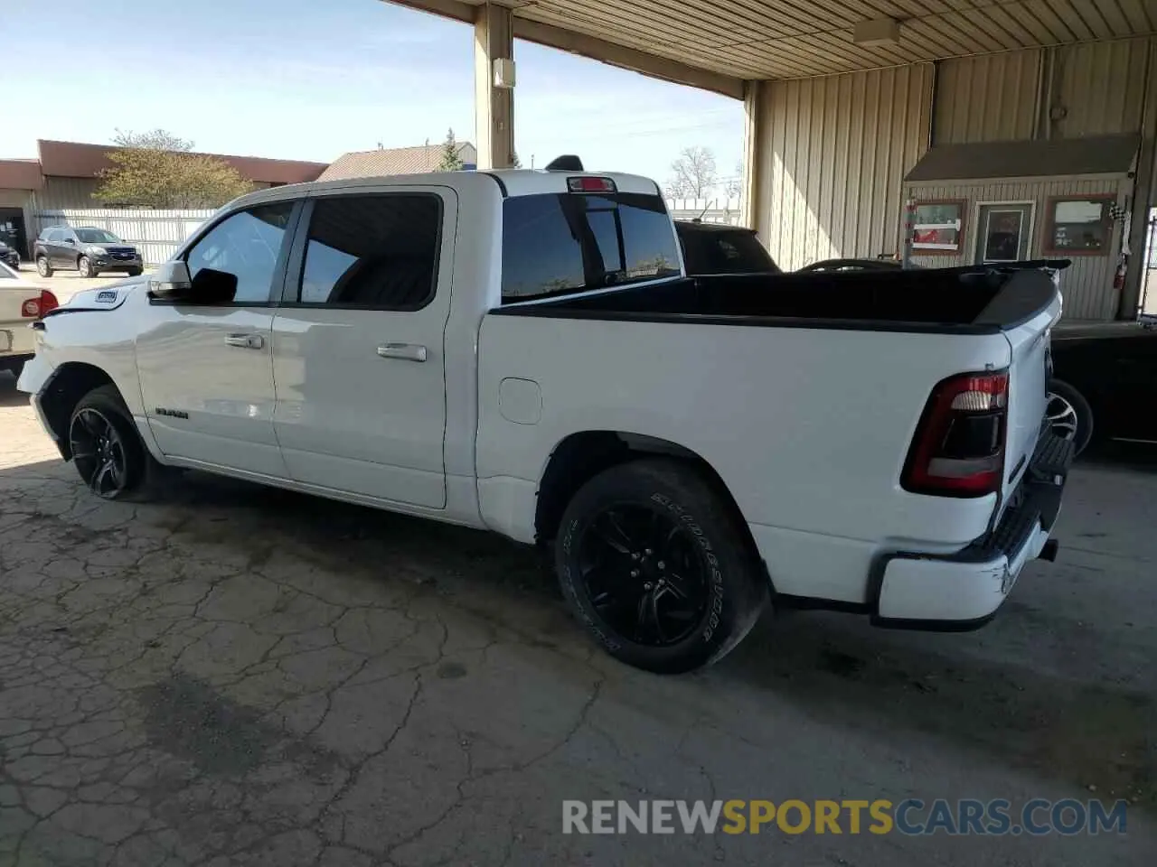 2 Photograph of a damaged car 1C6RRFFG0LN288573 RAM 1500 2020