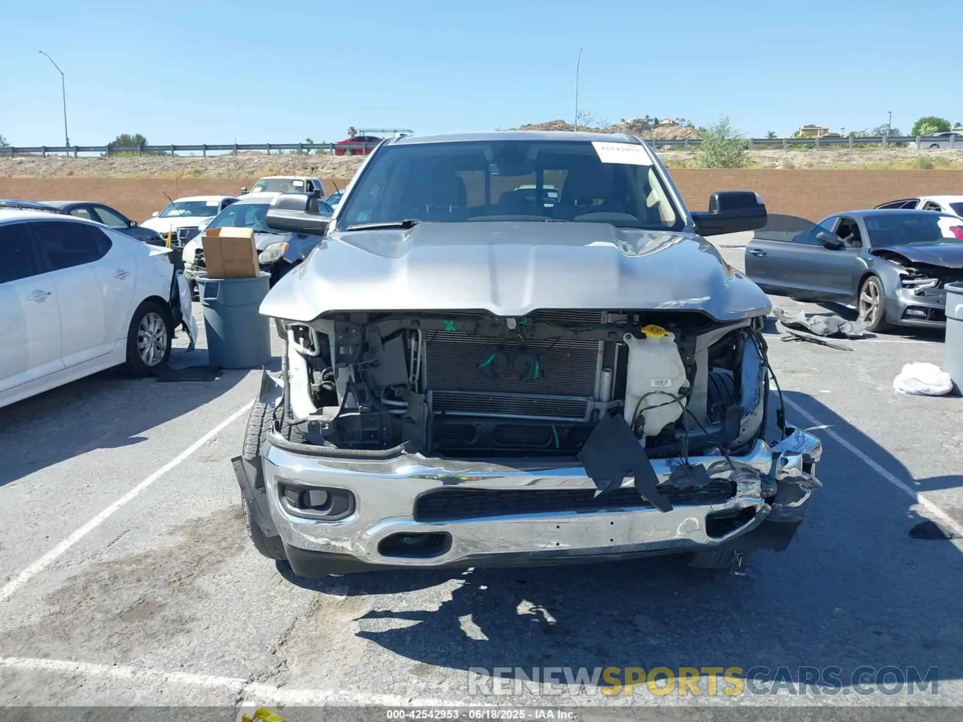 13 Photograph of a damaged car 1C6RRFFG4LN371472 RAM 1500 2020