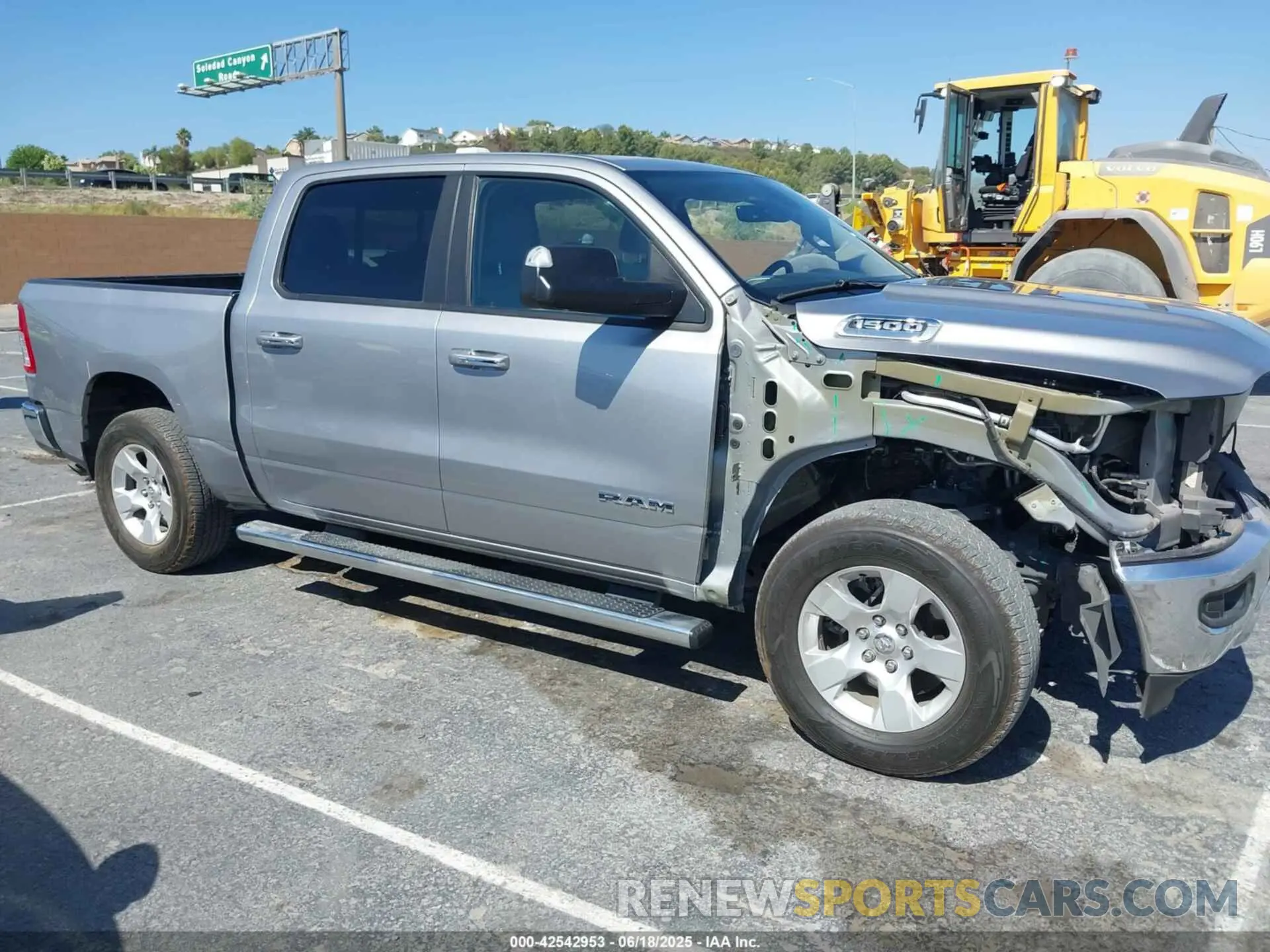 14 Photograph of a damaged car 1C6RRFFG4LN371472 RAM 1500 2020