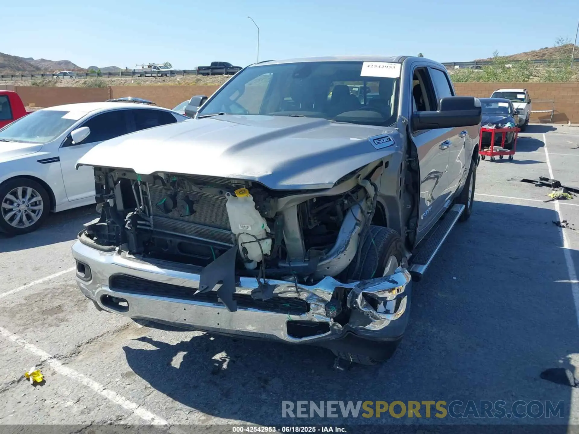 2 Photograph of a damaged car 1C6RRFFG4LN371472 RAM 1500 2020