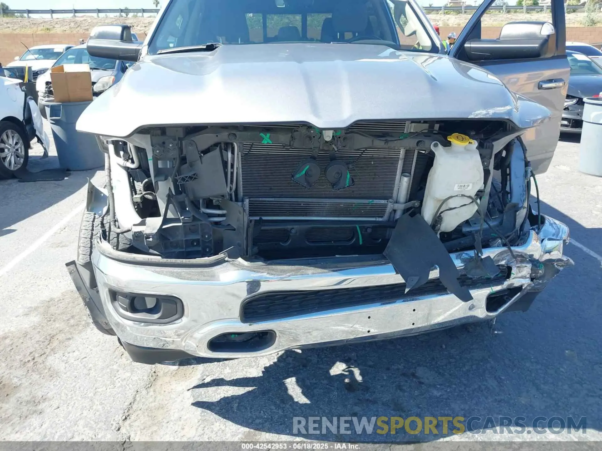 6 Photograph of a damaged car 1C6RRFFG4LN371472 RAM 1500 2020