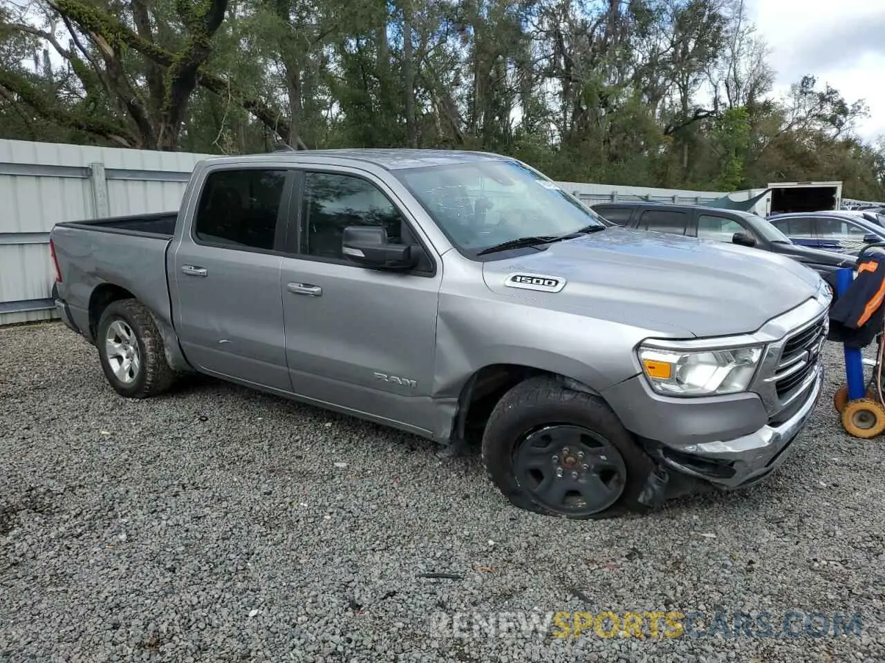 4 Photograph of a damaged car 1C6RRFFG6LN361011 RAM 1500 2020
