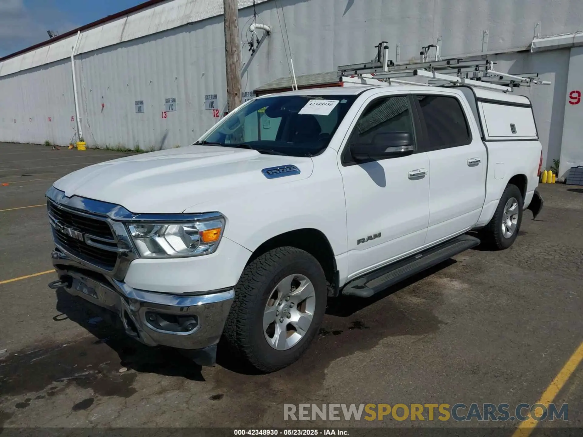 2 Photograph of a damaged car 1C6RRFFG7LN263363 RAM 1500 2020