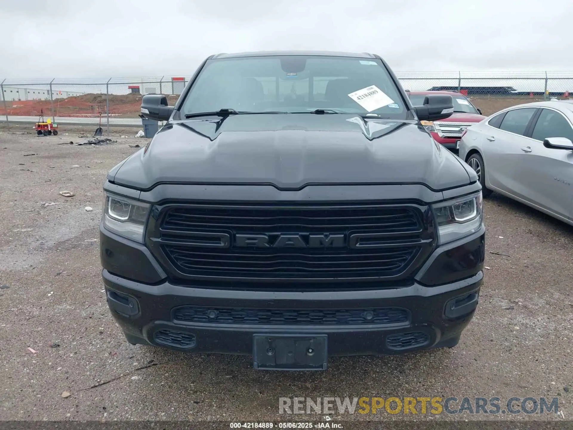 12 Photograph of a damaged car 1C6RRFFG7LN273861 RAM 1500 2020