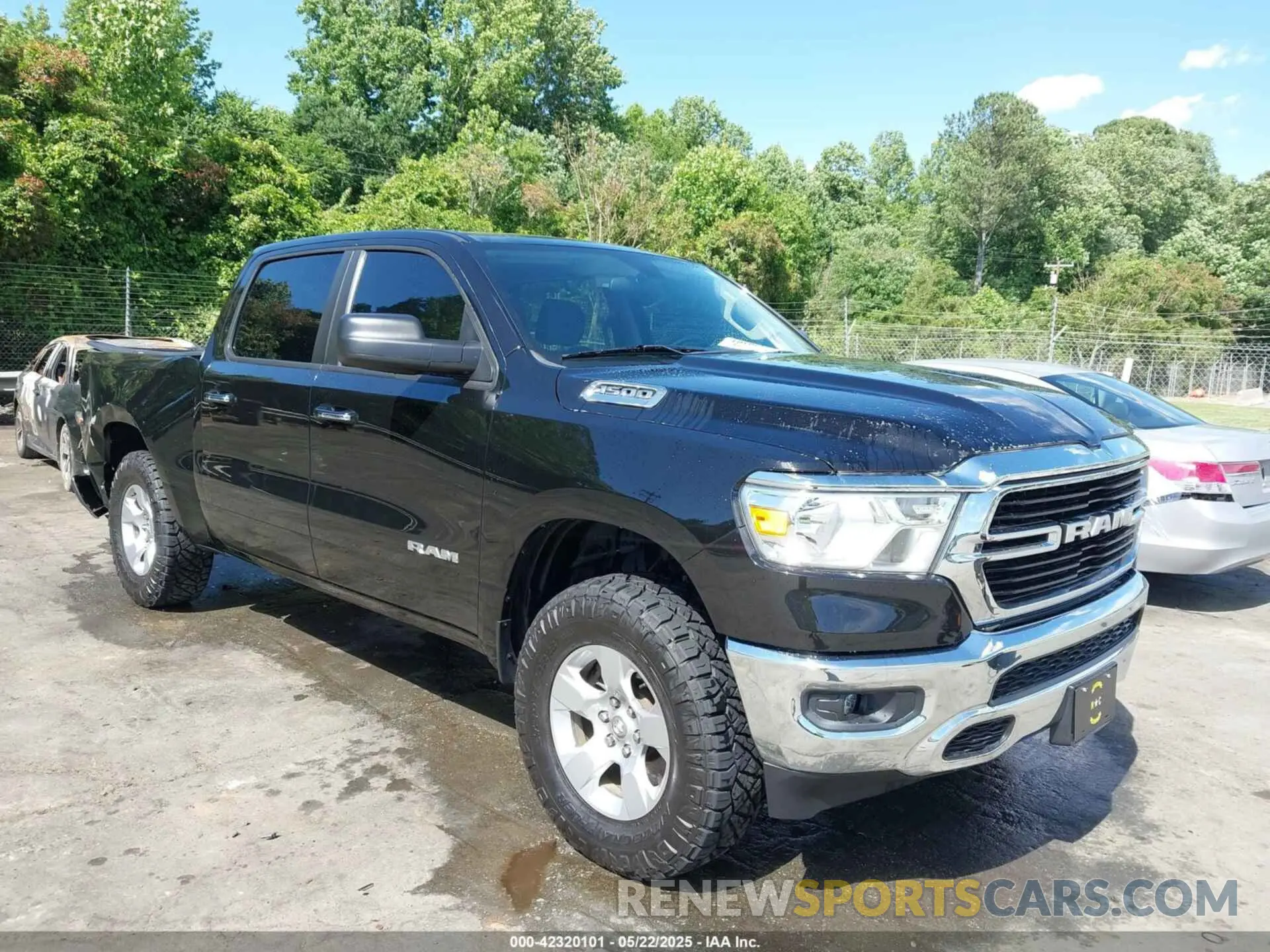1 Photograph of a damaged car 1C6RRFFG8LN120583 RAM 1500 2020