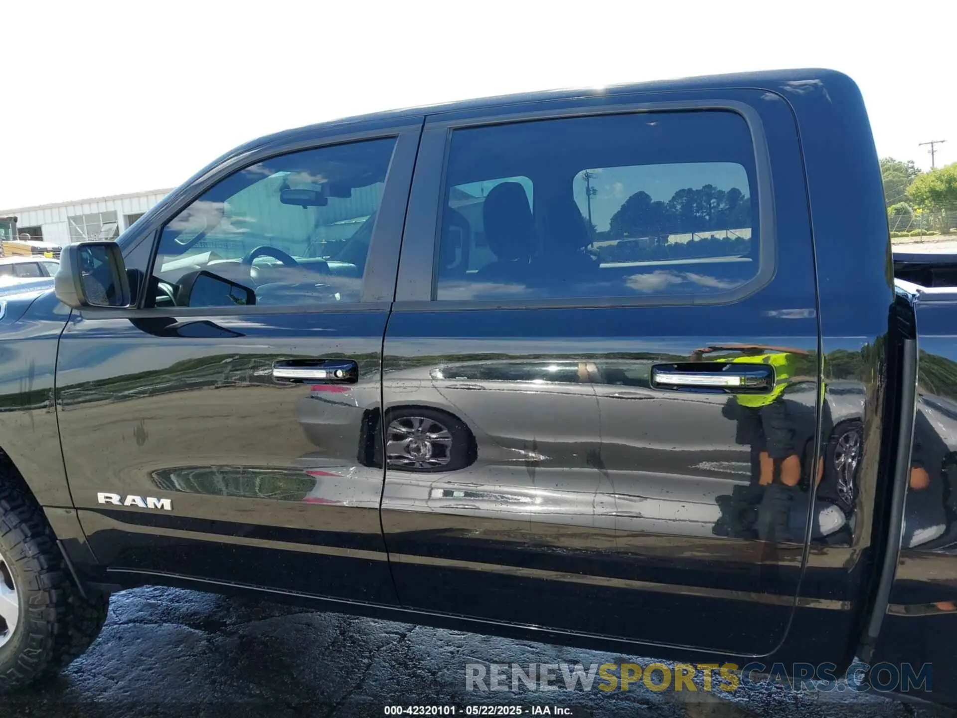14 Photograph of a damaged car 1C6RRFFG8LN120583 RAM 1500 2020