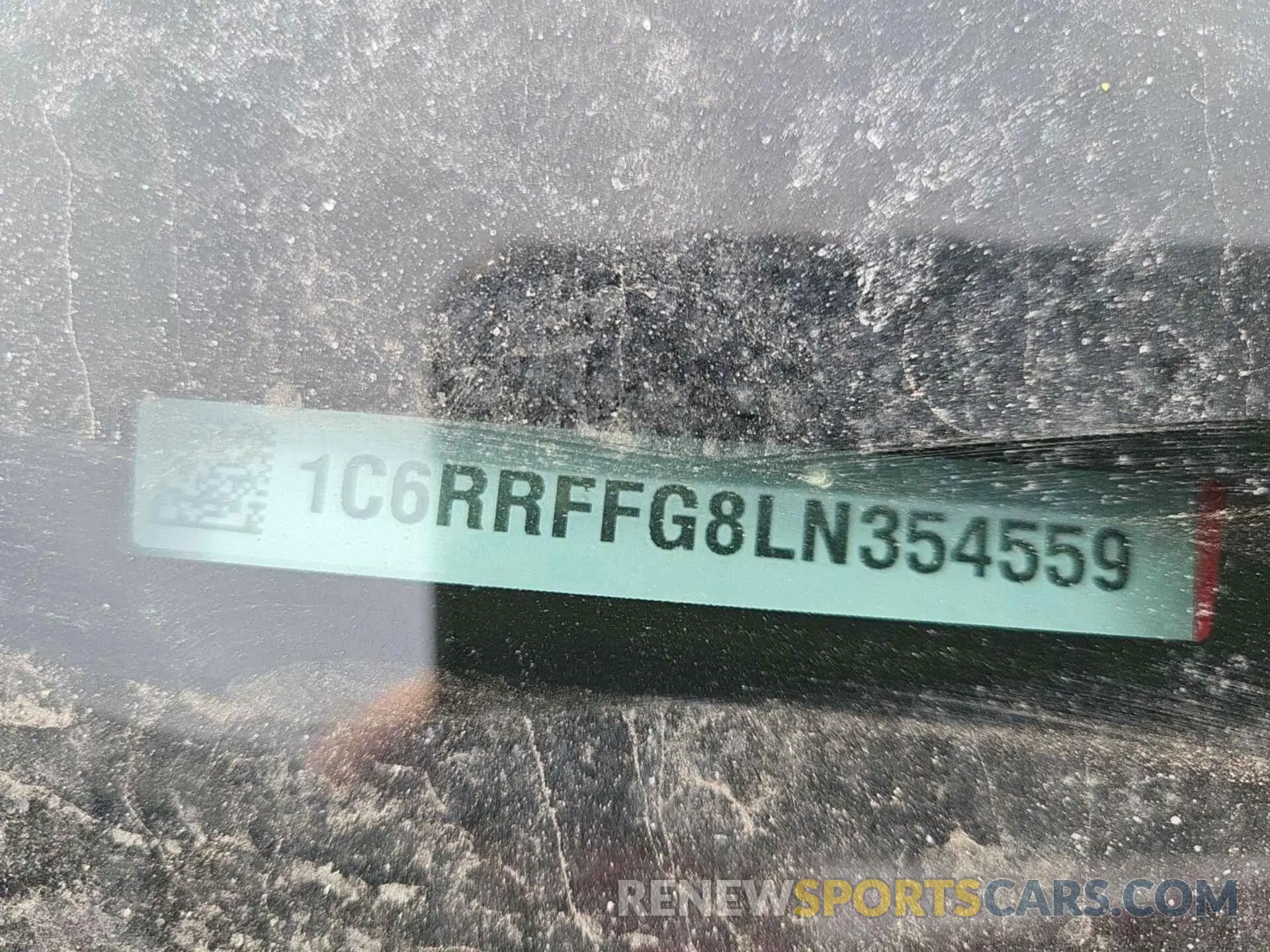 19 Photograph of a damaged car 1C6RRFFG8LN354559 RAM 1500 2020