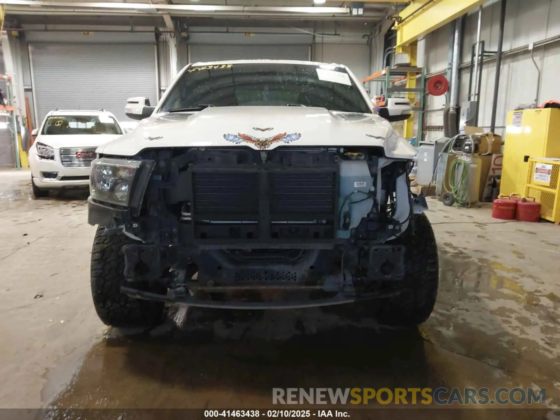 13 Photograph of a damaged car 1C6RRFFG8LN379073 RAM 1500 2020