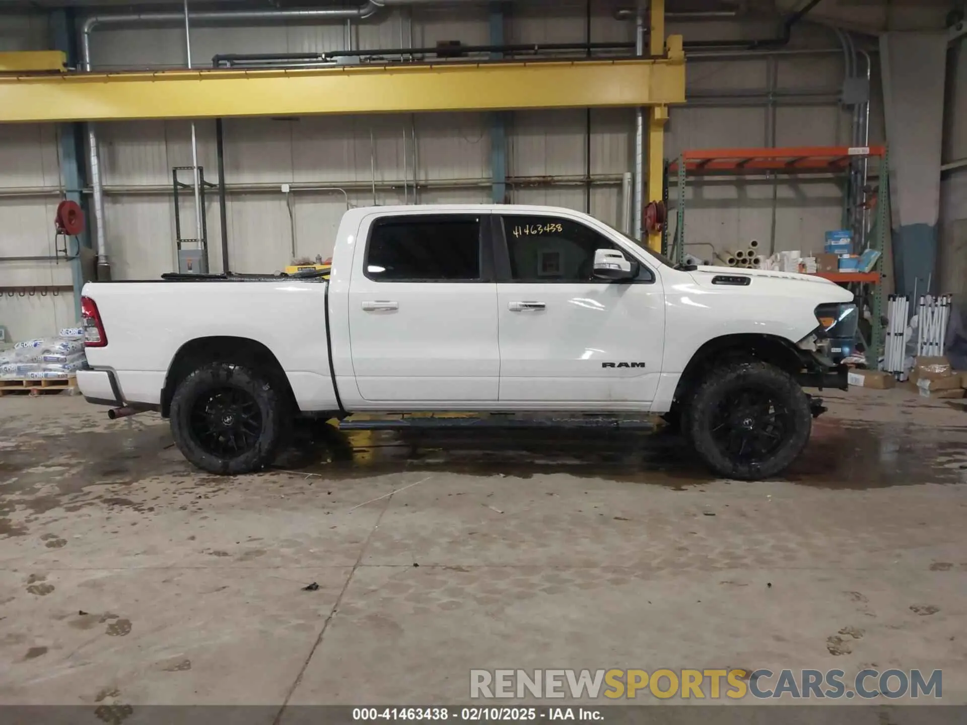 14 Photograph of a damaged car 1C6RRFFG8LN379073 RAM 1500 2020