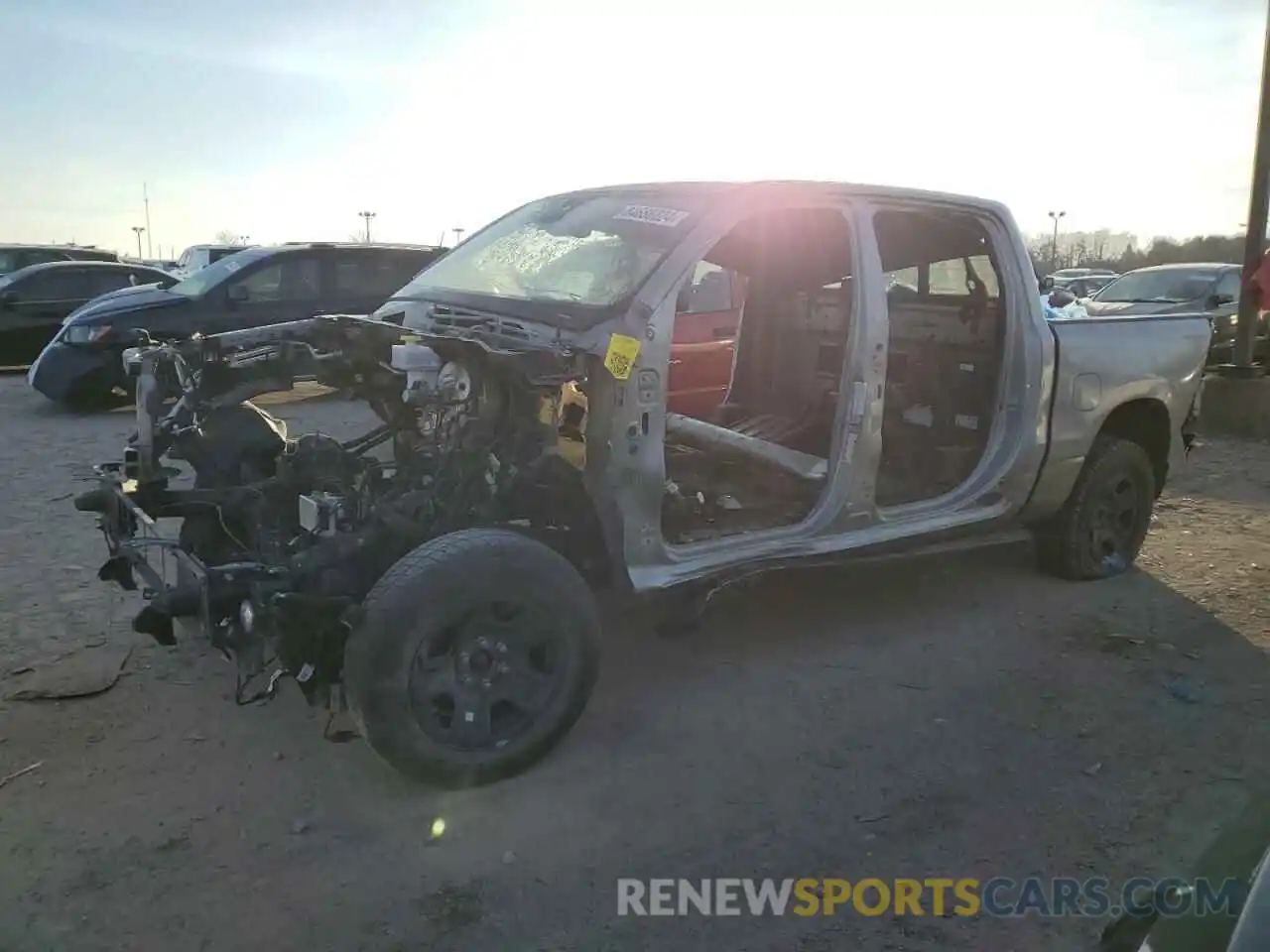 1 Photograph of a damaged car 1C6RRFFG9LN341383 RAM 1500 2020