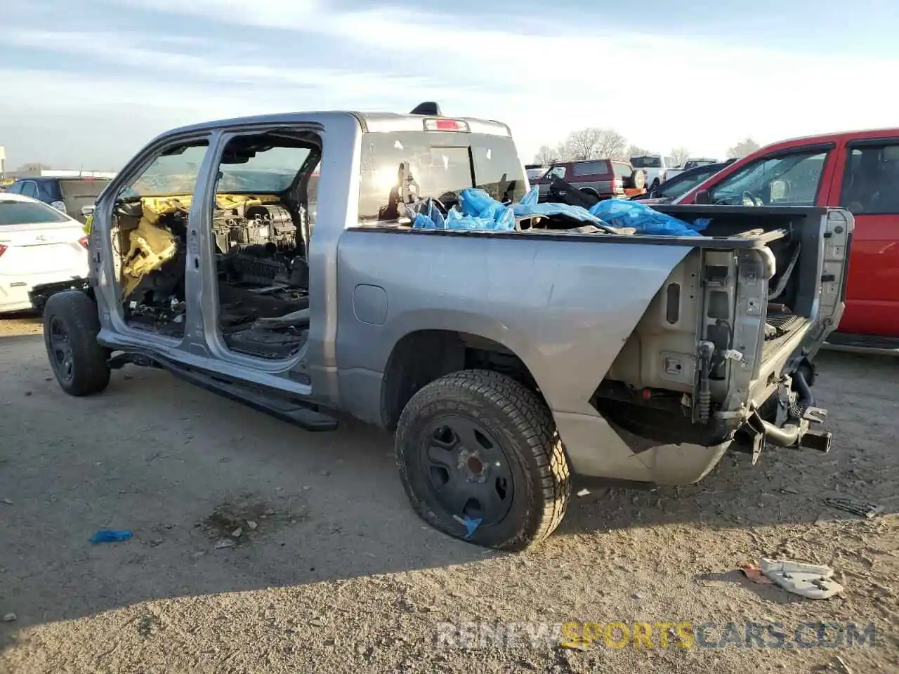 2 Photograph of a damaged car 1C6RRFFG9LN341383 RAM 1500 2020