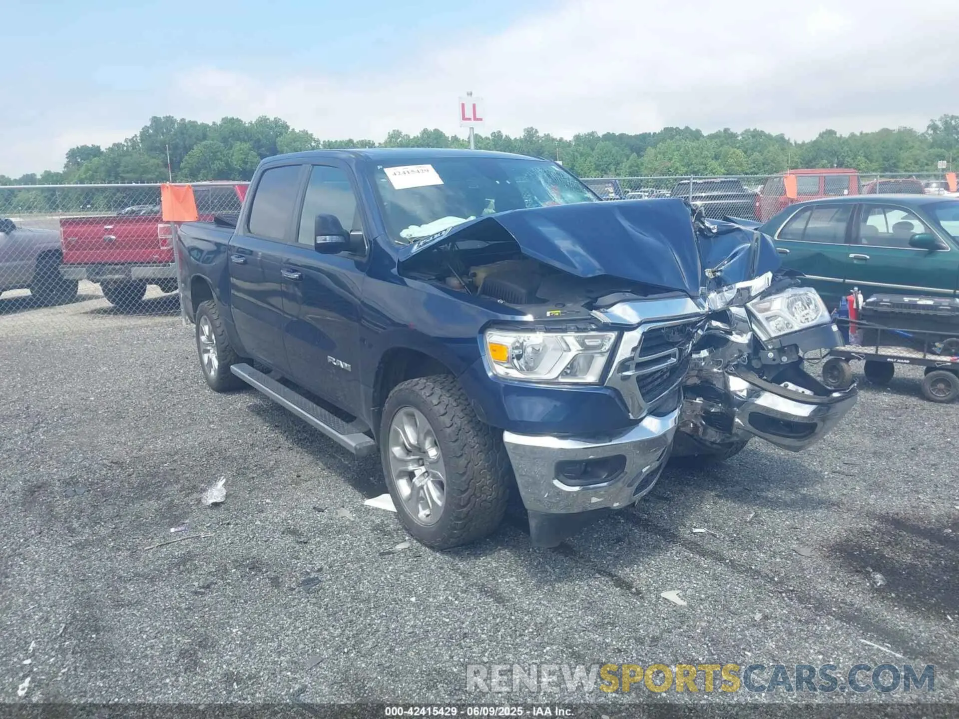 1 Photograph of a damaged car 1C6RRFFG9LN380197 RAM 1500 2020