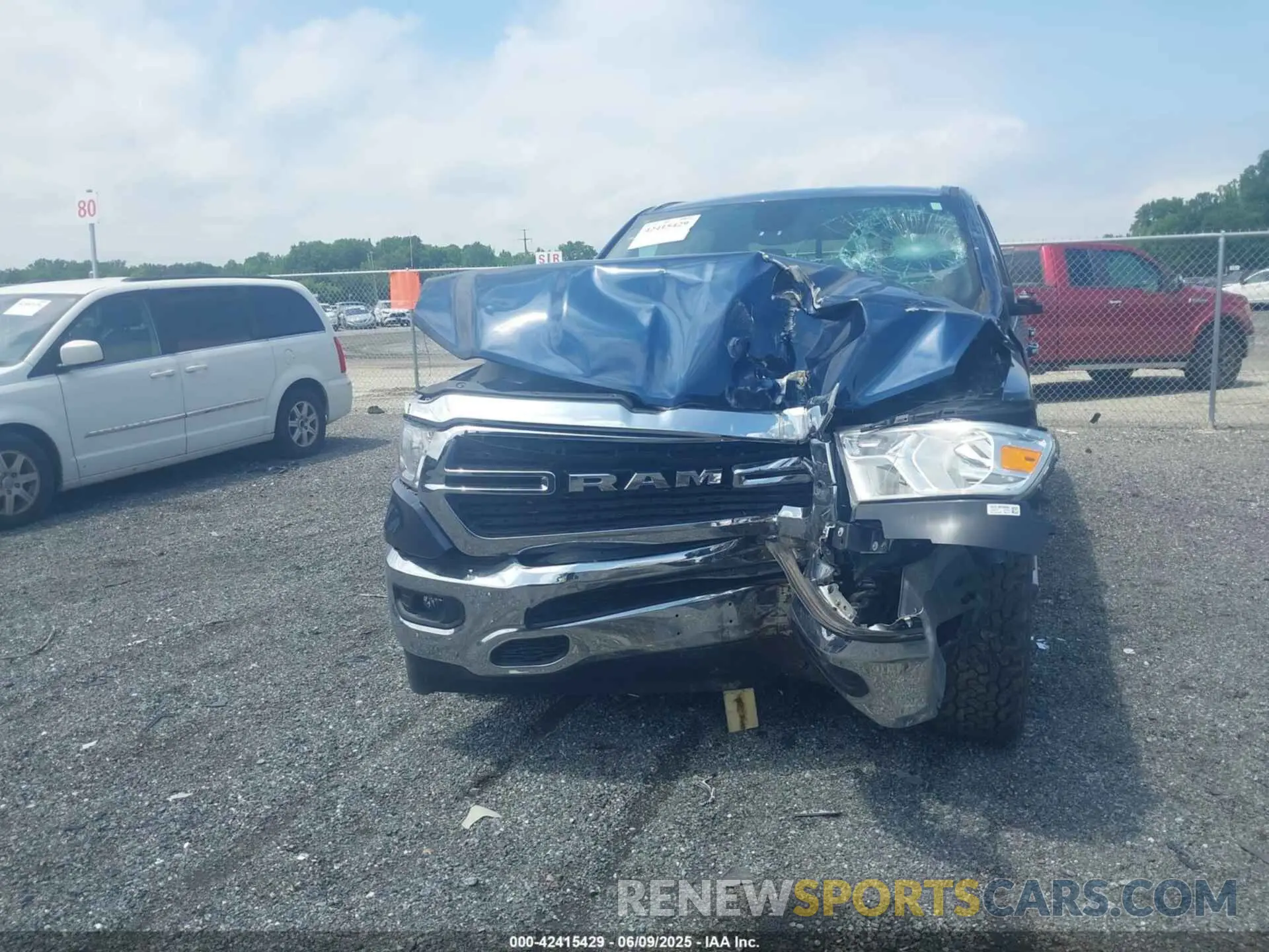 12 Photograph of a damaged car 1C6RRFFG9LN380197 RAM 1500 2020