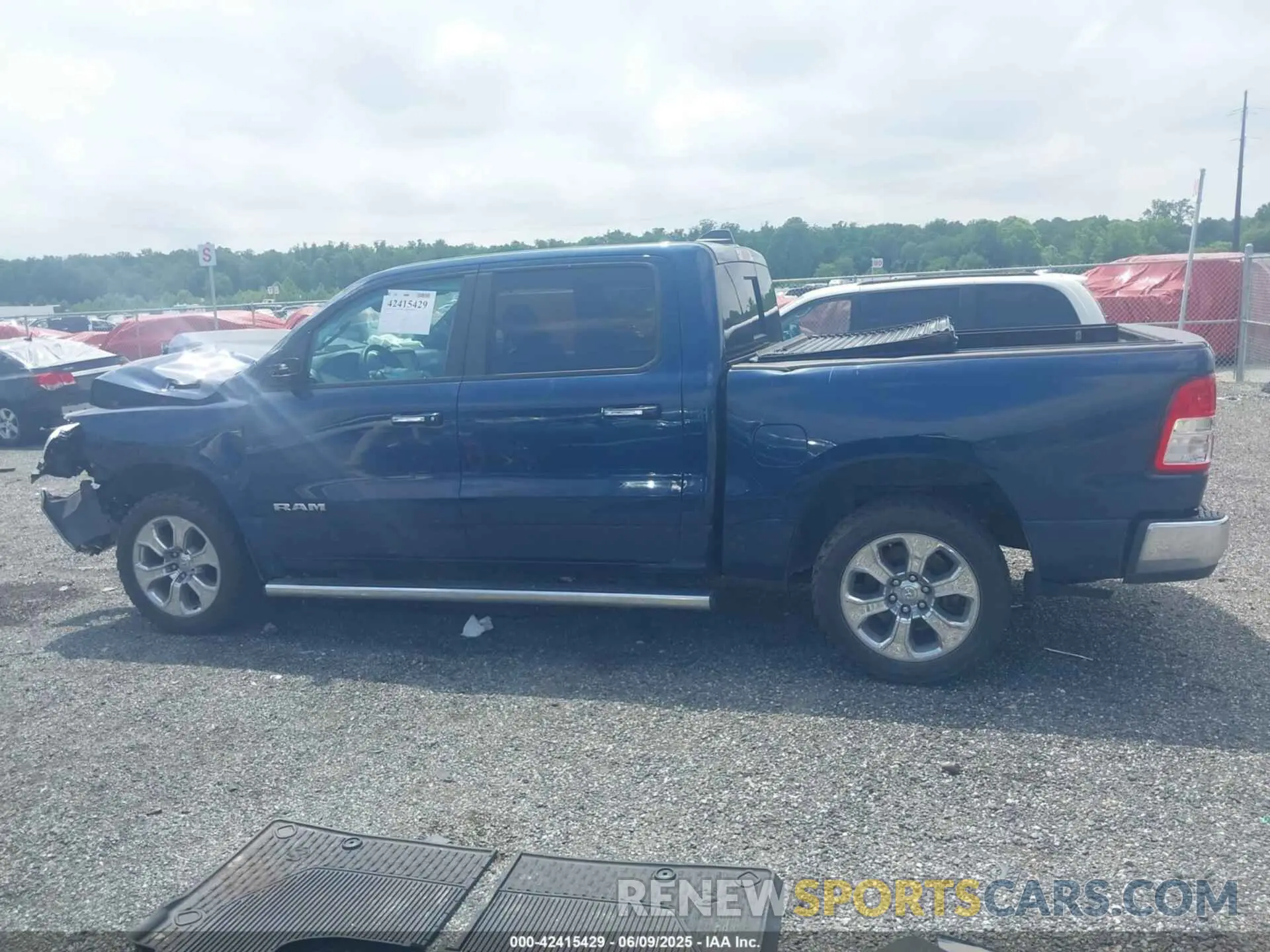14 Photograph of a damaged car 1C6RRFFG9LN380197 RAM 1500 2020