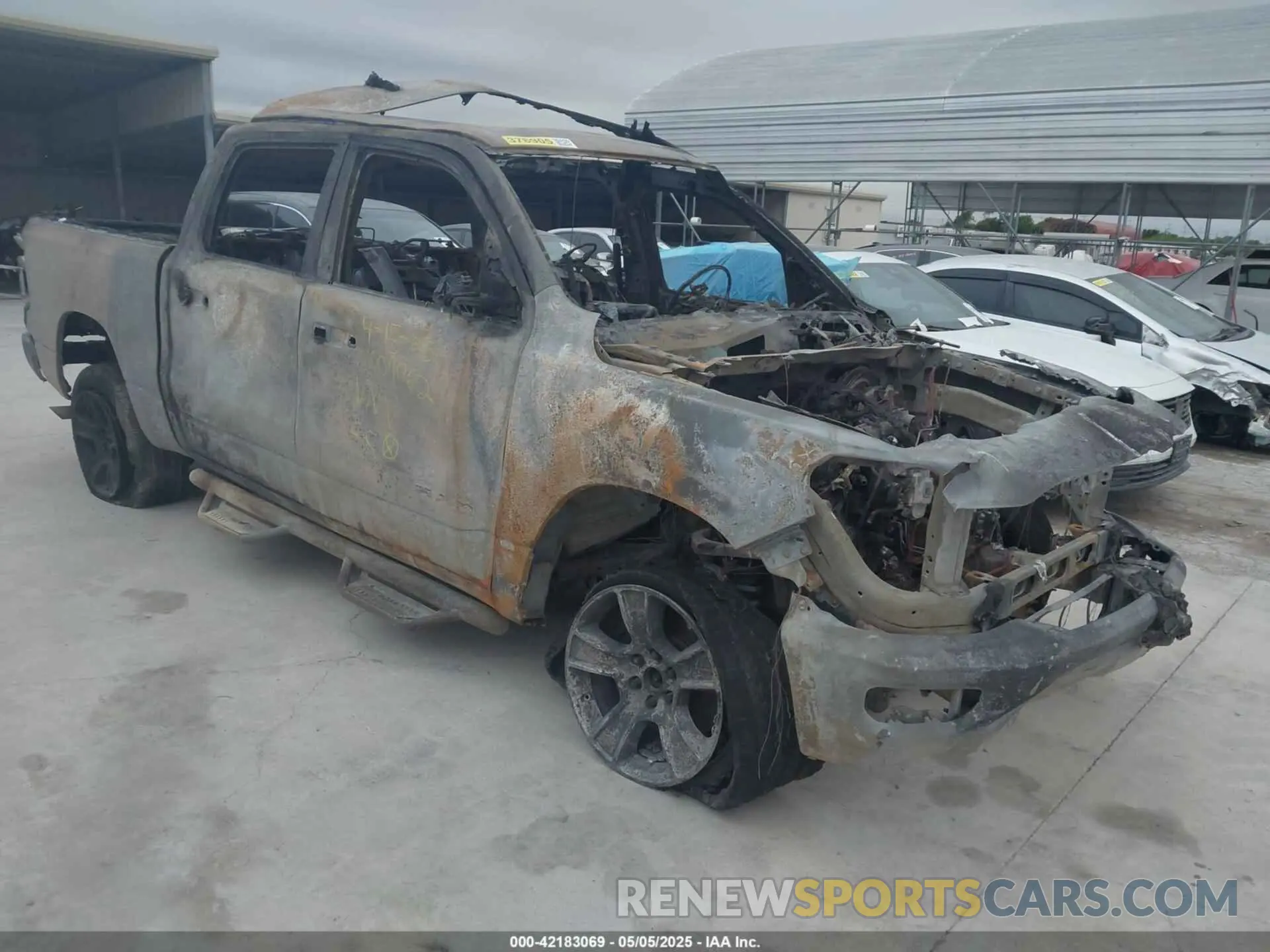 1 Photograph of a damaged car 1C6RRFFGXLN341957 RAM 1500 2020