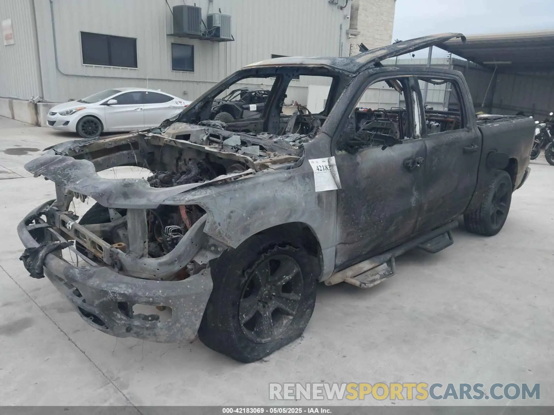 2 Photograph of a damaged car 1C6RRFFGXLN341957 RAM 1500 2020