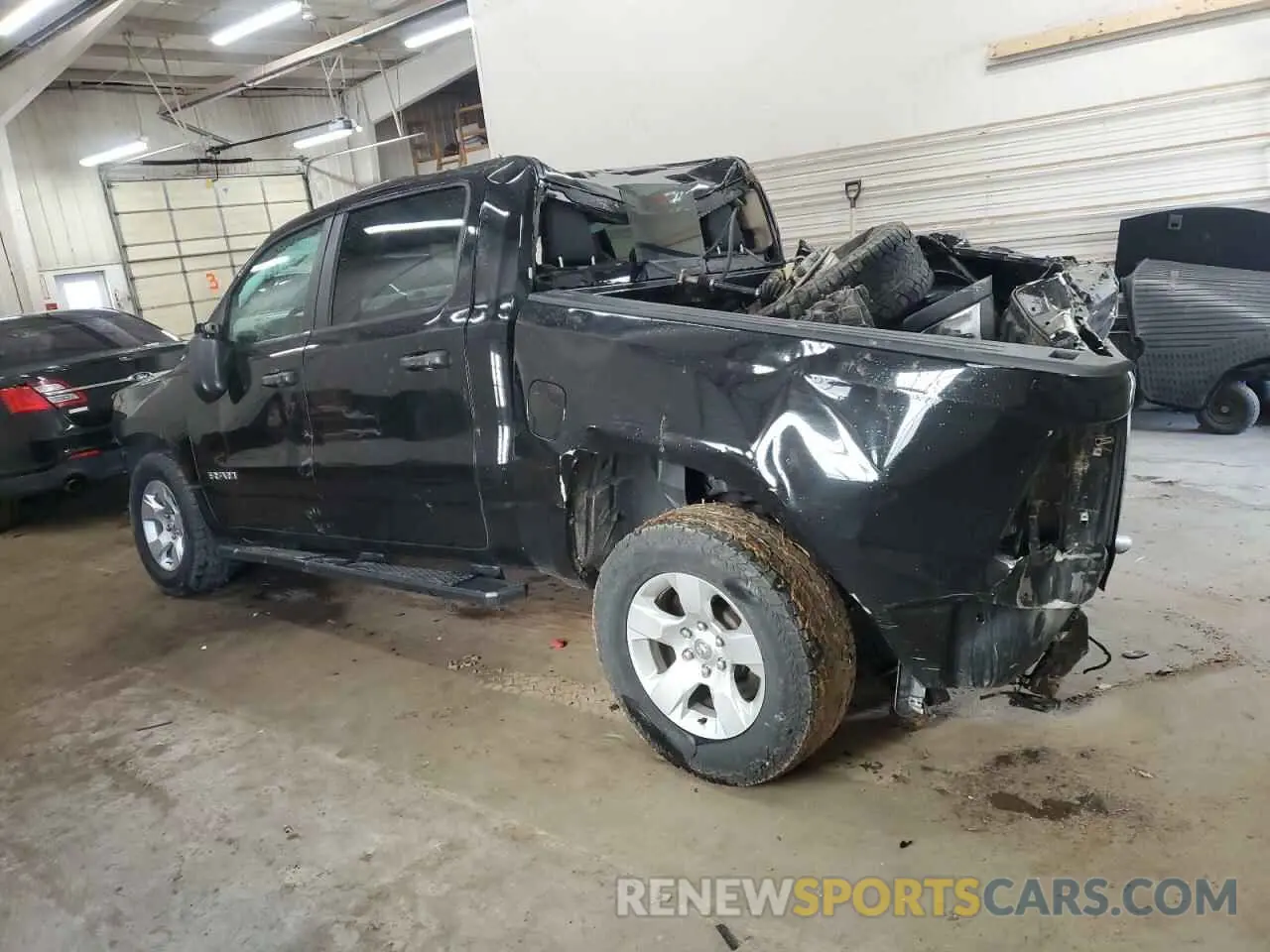 2 Photograph of a damaged car 1C6RRFGG0LN275241 RAM 1500 2020