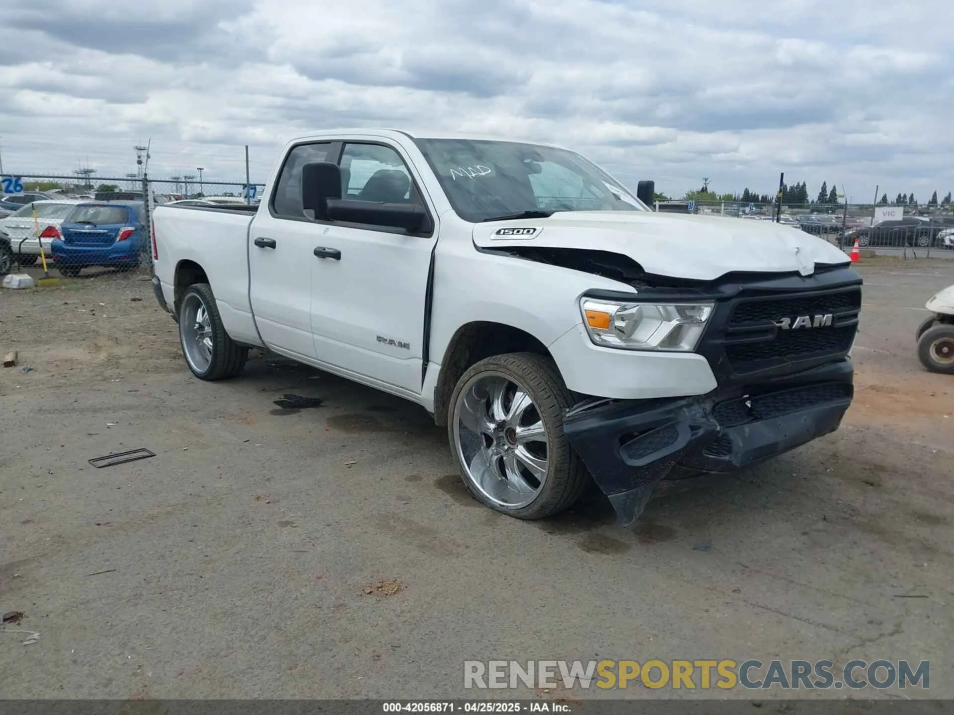 1 Photograph of a damaged car 1C6SRECG6LN386006 RAM 1500 2020