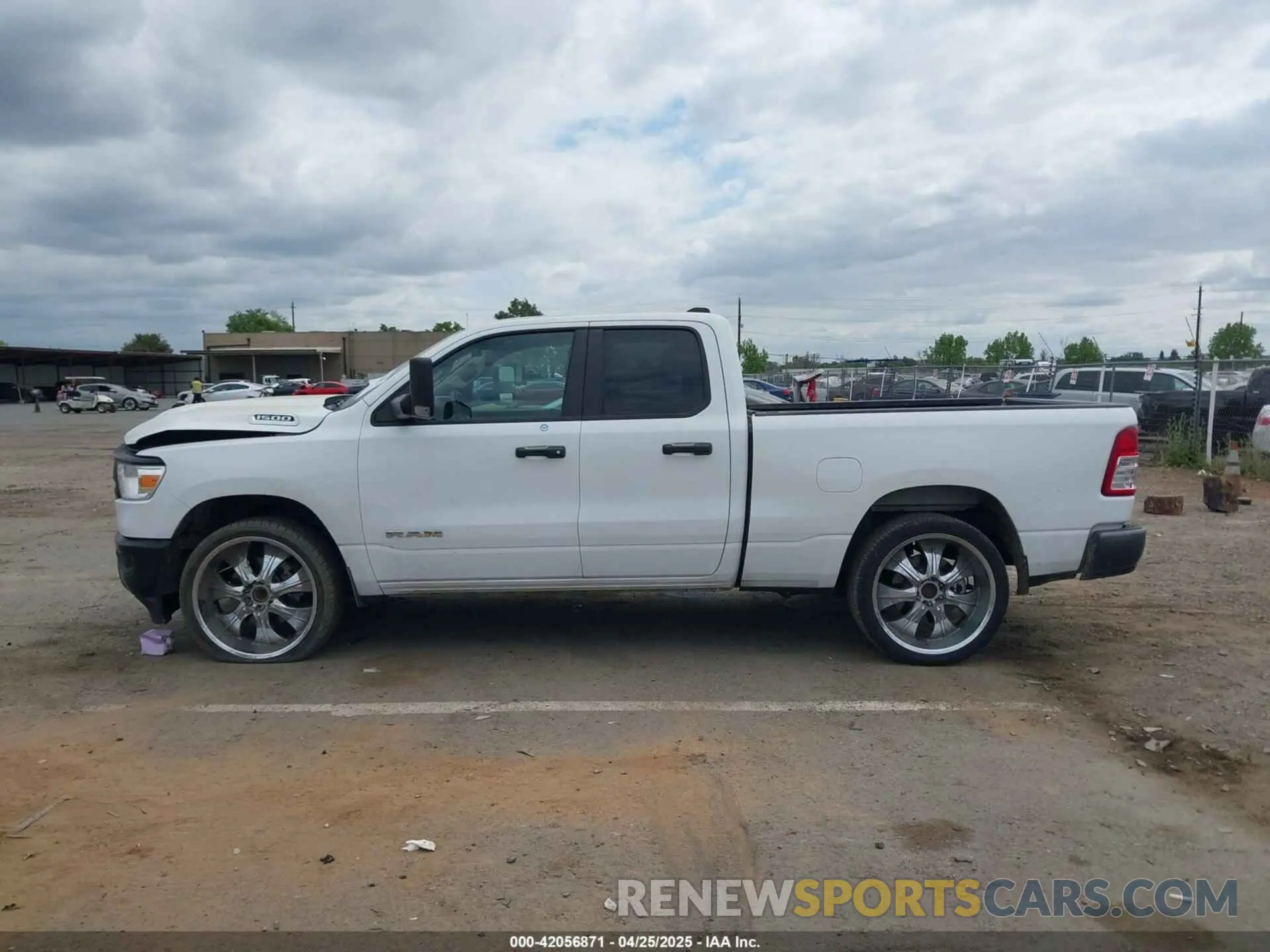 14 Photograph of a damaged car 1C6SRECG6LN386006 RAM 1500 2020