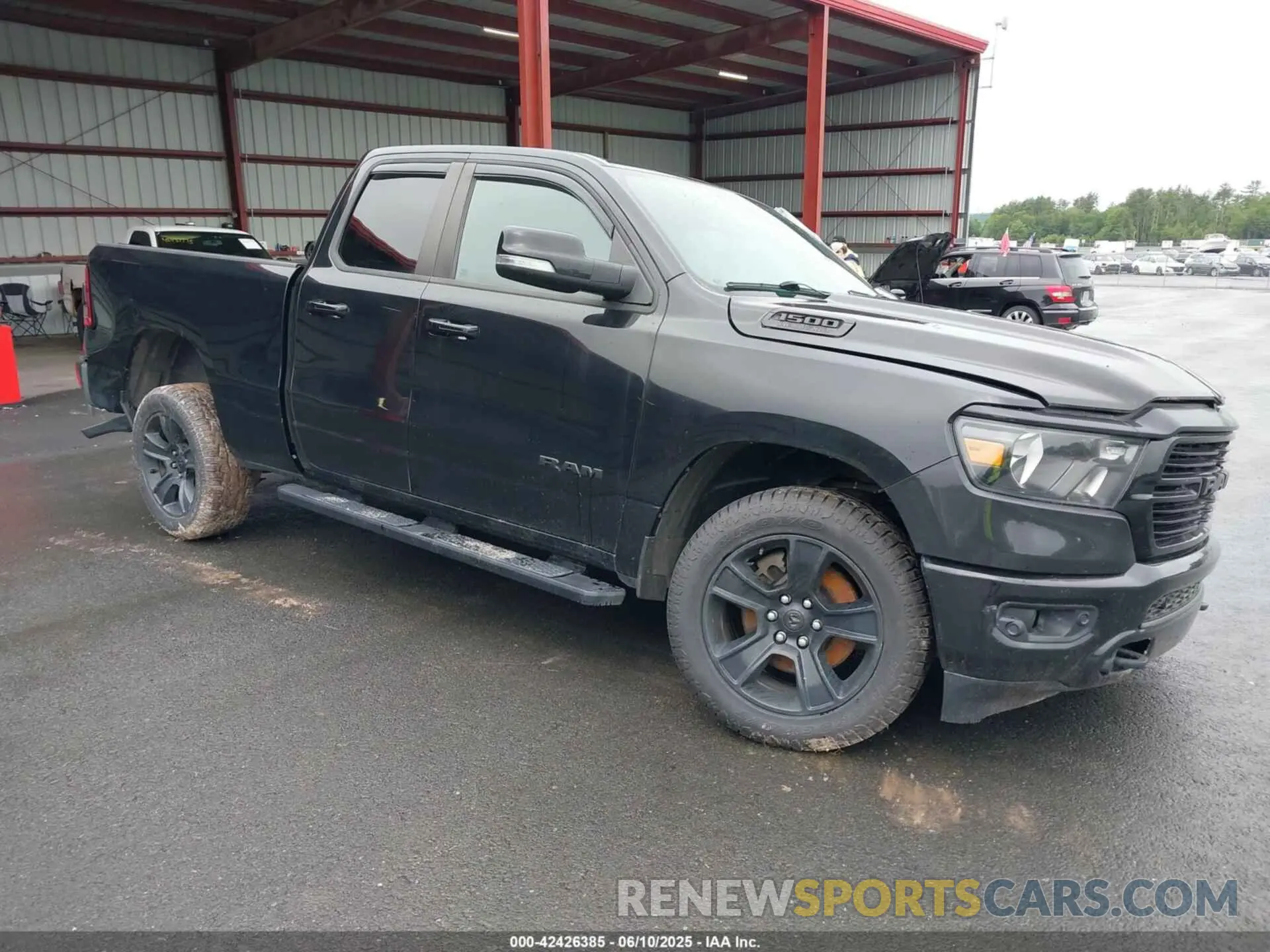 1 Photograph of a damaged car 1C6SRFBT0LN242228 RAM 1500 2020