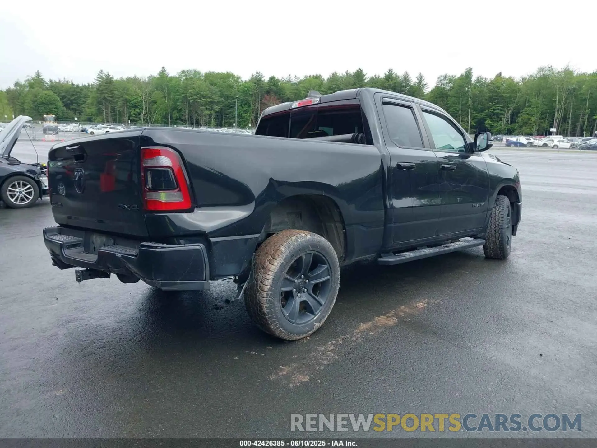 4 Photograph of a damaged car 1C6SRFBT0LN242228 RAM 1500 2020