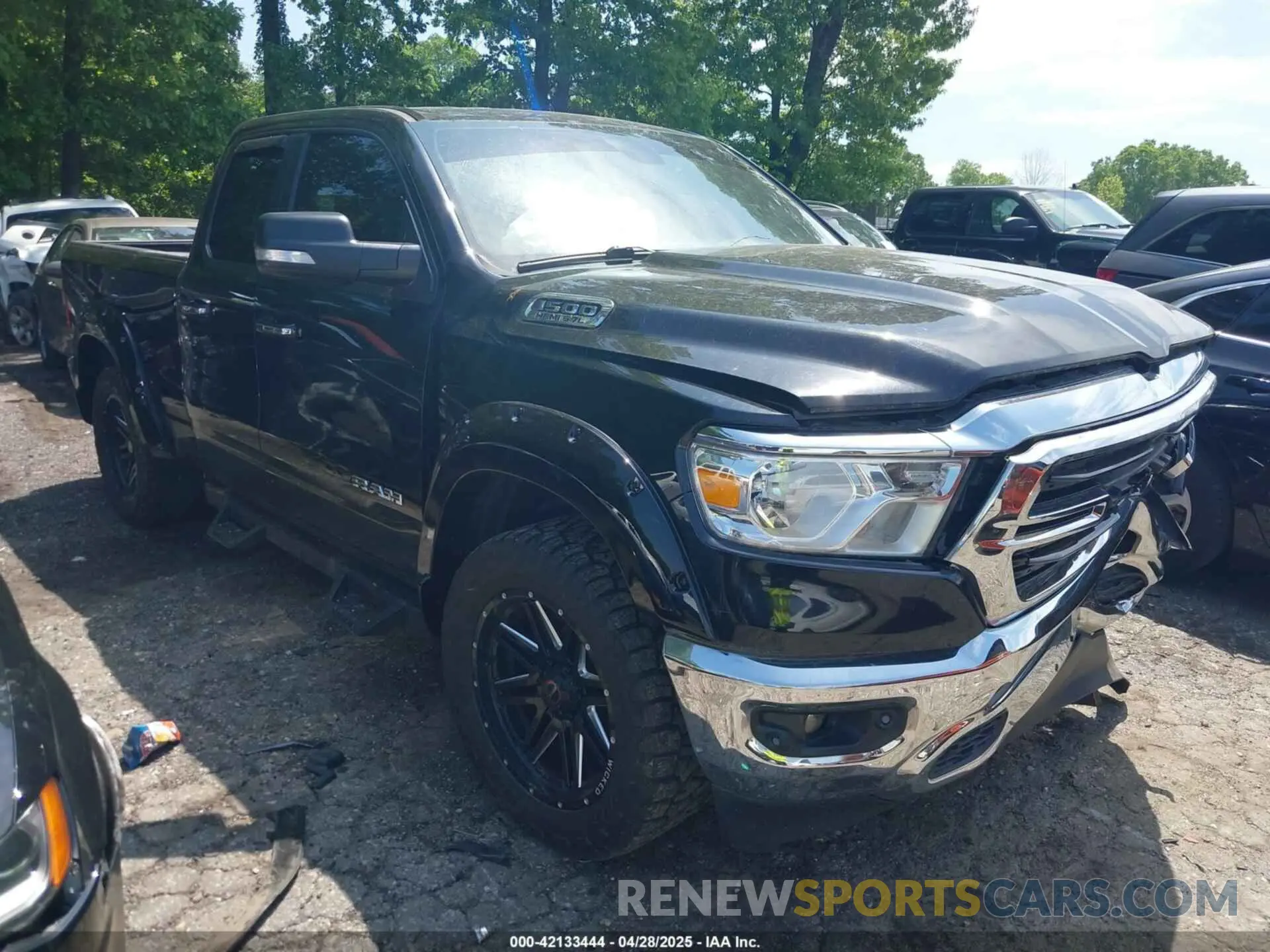 1 Photograph of a damaged car 1C6SRFBT0LN280347 RAM 1500 2020
